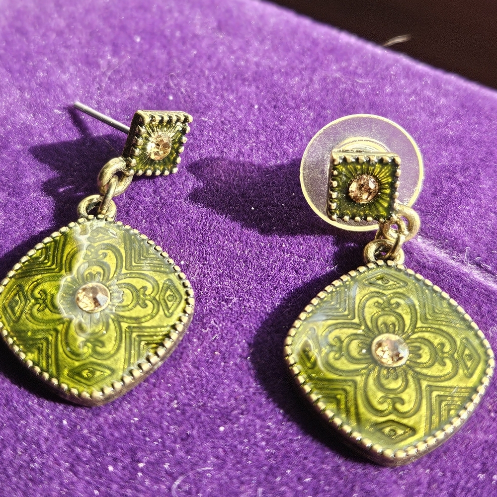 Bronze and green tone earrings with beautiful patterns and center rhinestone.